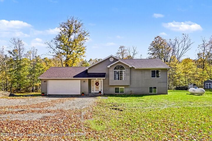 Property Photo:  10884 Wilderness Circle  MI 48890 