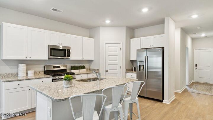 Property Photo:  2209 NW Wild Indigo Circle NW 62  NC 28467 