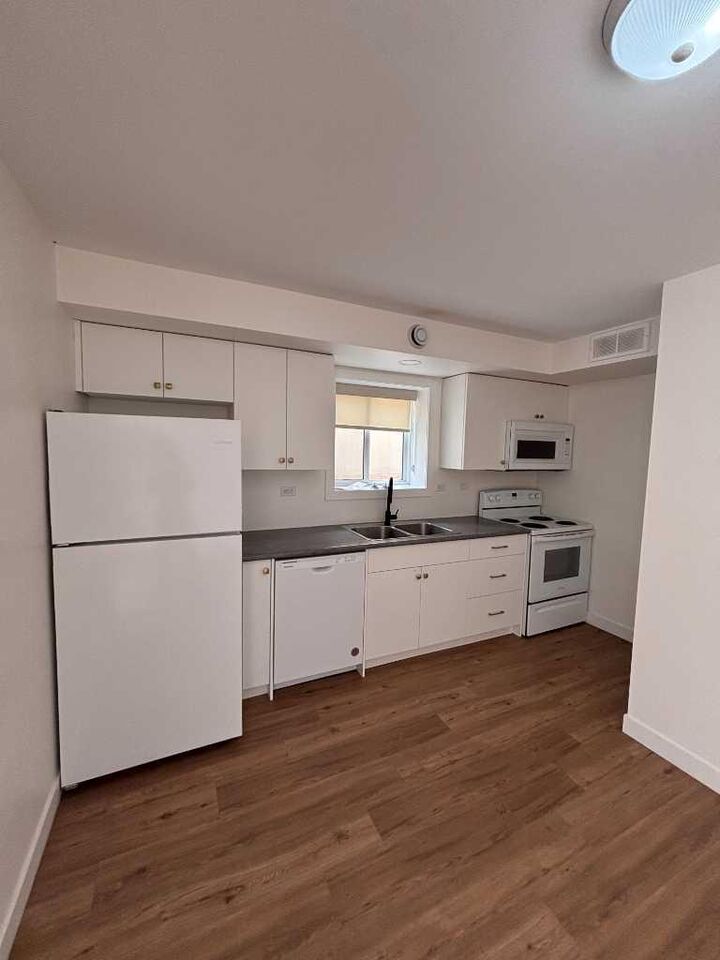Property Photo:  6014 54 Street E  AB T1G 1K3 
