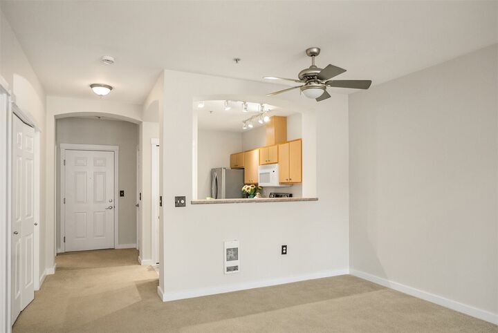 Property Photo:  13301 SE 79th Place B409  WA 98059 