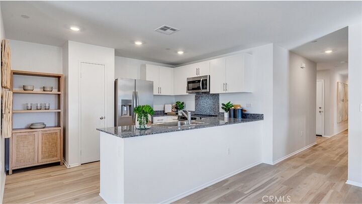 Property Photo:  7518 Princeton Avenue  CA 92345 