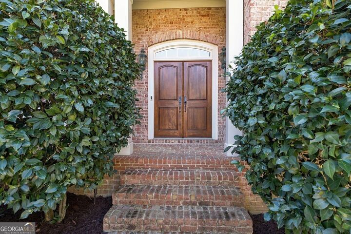 Property Photo: 9055 Bedford Way GA 30024
