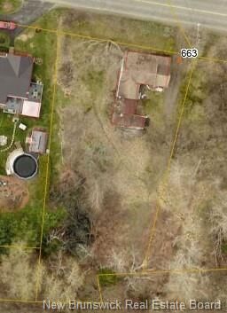 Property Photo:  663 Bay Street  NB E2M 7L6 