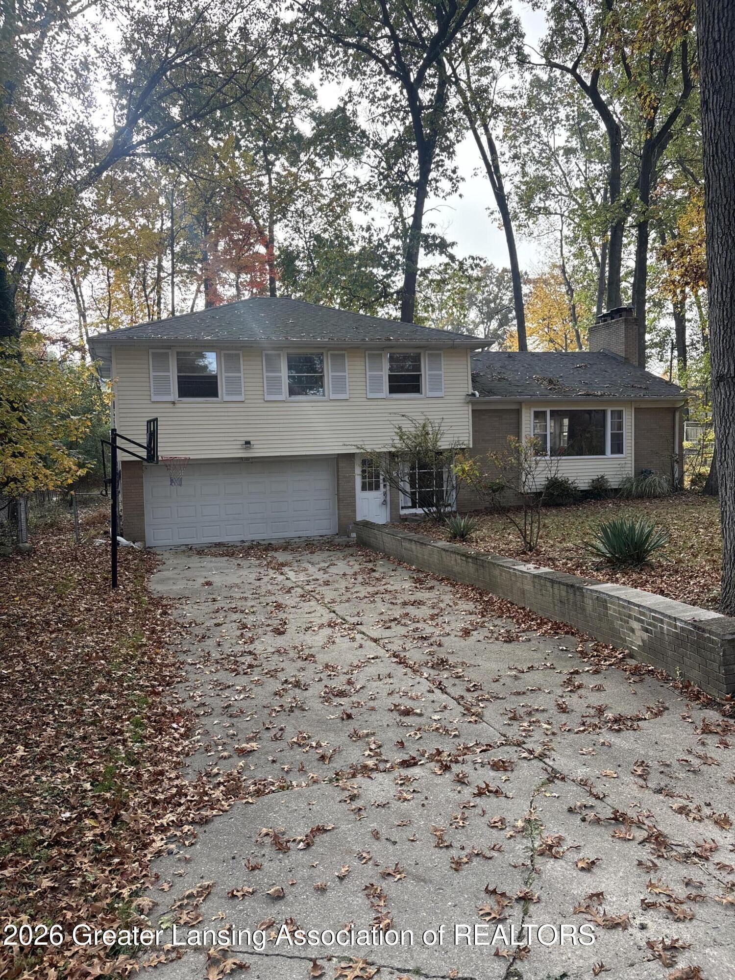 Property Photo:  4448 Greenwood Drive  MI 48864 