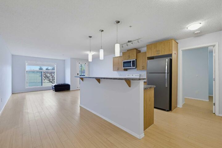 Property Photo:  700 Willowbrook Road NW 2105  AB T2R 0E5 