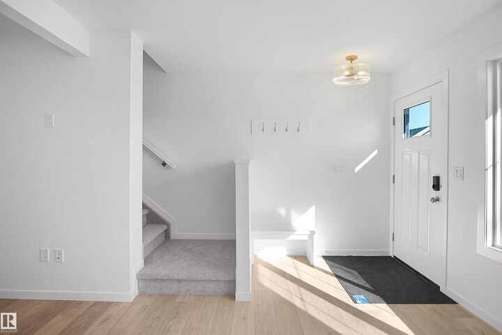 Property Photo:  21006 24 Avenue NW  AB T6M 2M7 