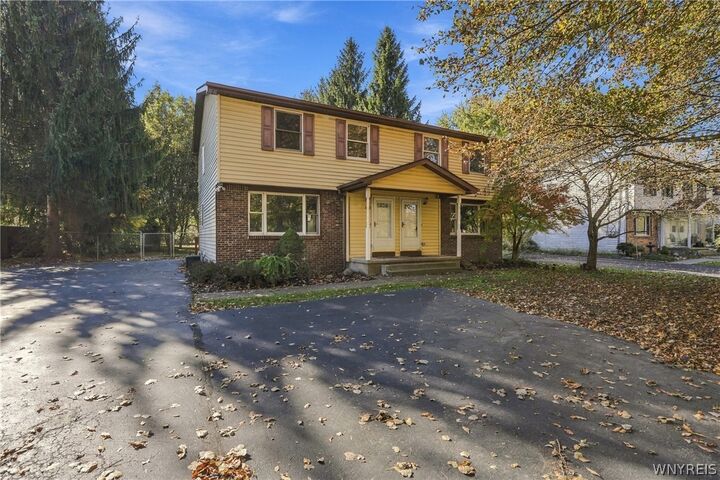 Property Photo:  1433 Como Park Boulevard  NY 14043 