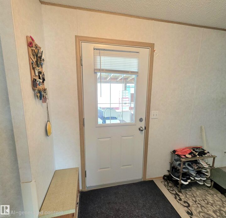 Property Photo: #106 5309 52 Street AB T7L 1L5