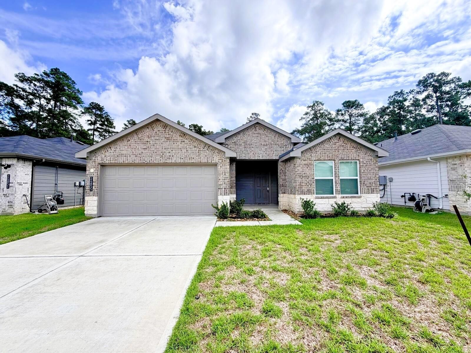 Property Photo: 24855 Springbluff Valley Court TX 77355