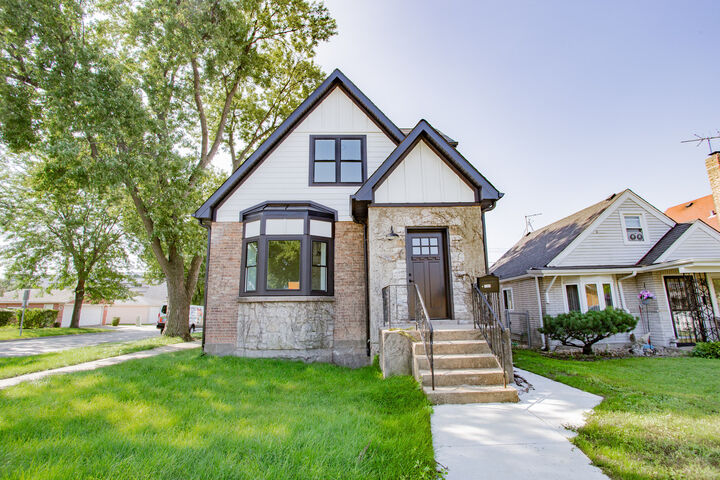 Property Photo:  7301 W Pensacola Avenue  IL 60706 