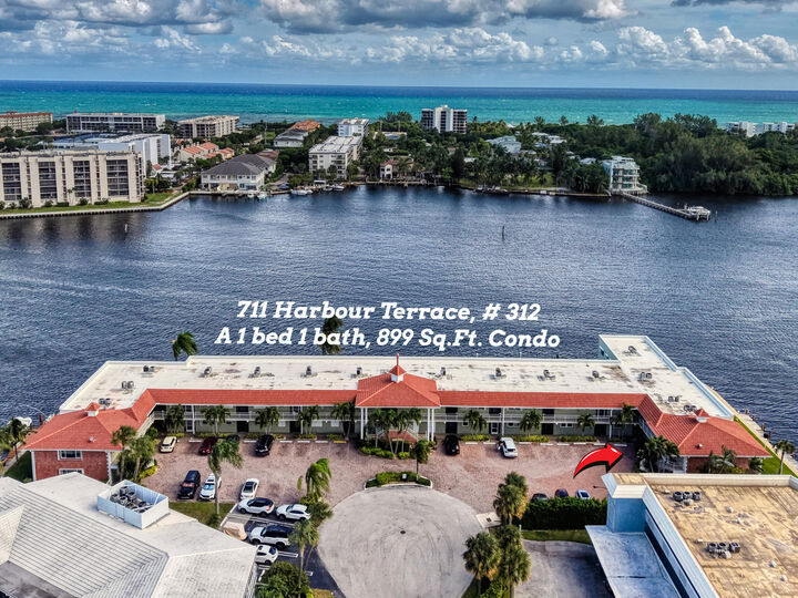 Property Photo:  711 NE Harbour Terrace 312  FL 33431 
