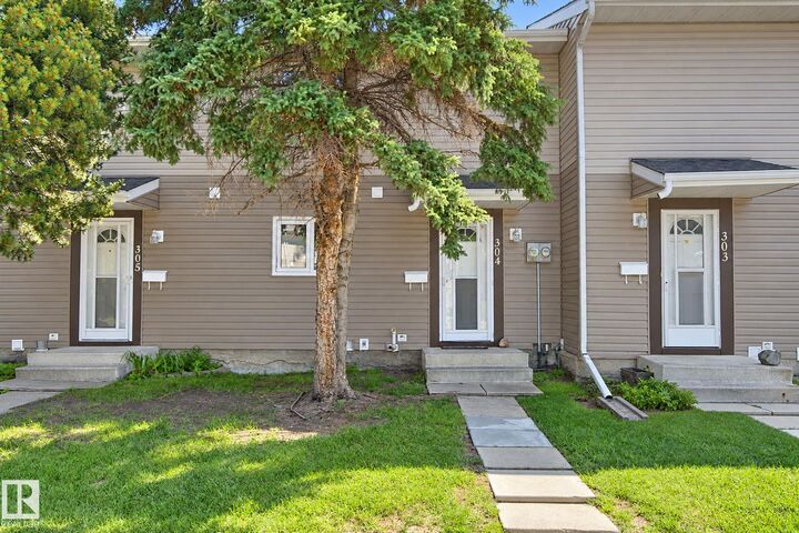 Property Photo:  304 Spruce Glen  AB T7X 2J7 
