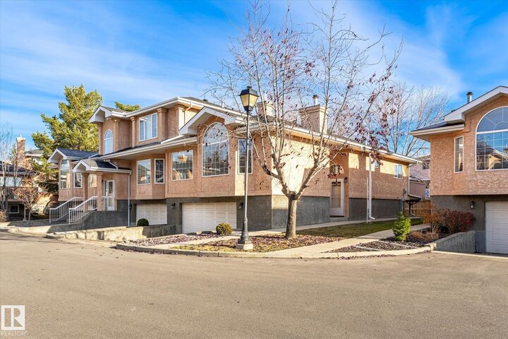 Property Photo:  11115 9 Ave NW 111  AB T6J 6Z1 