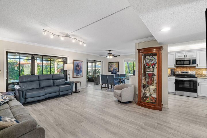 Property Photo:  10771 Palm Lake Avenue 102  FL 33437 