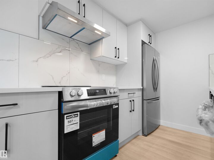 Property Photo: 126 Woodstock NW AB T5T 0H6