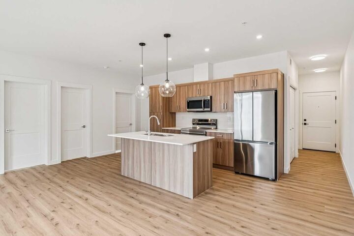 Property Photo: 3700 Seton Avenue SE 3207 AB T3M 4J1