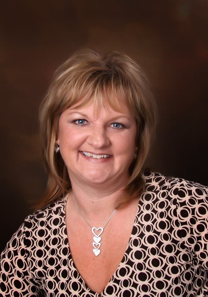 Tracey Campbell,  in Clio, Signature Realty