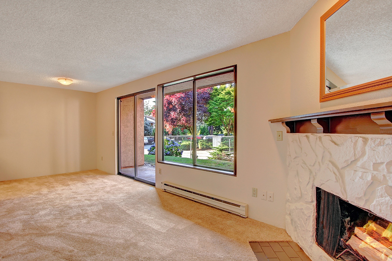 Property Photo: Spacious living room and dining area 12516 NE 117th Place C7  WA 98034 
