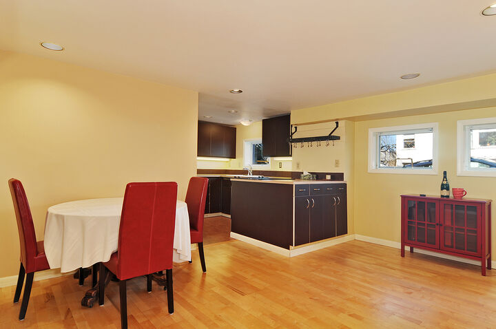 Property Photo: Dining room, kitchen, living room 435 11th Ave E 3 WA 98102